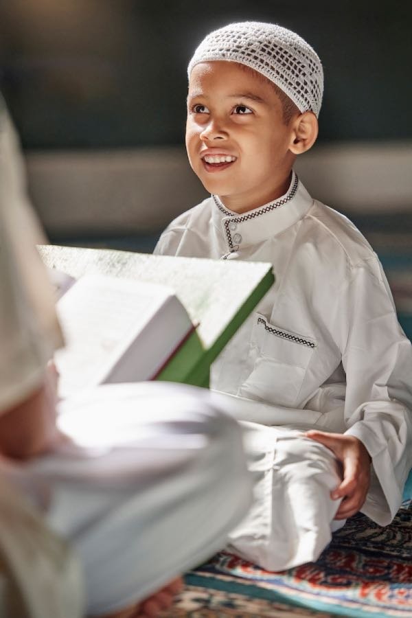 Child Reading Quran