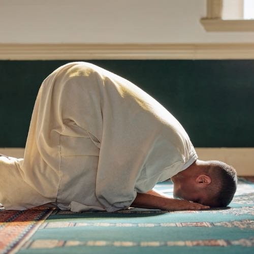 Man Performaning Sajda